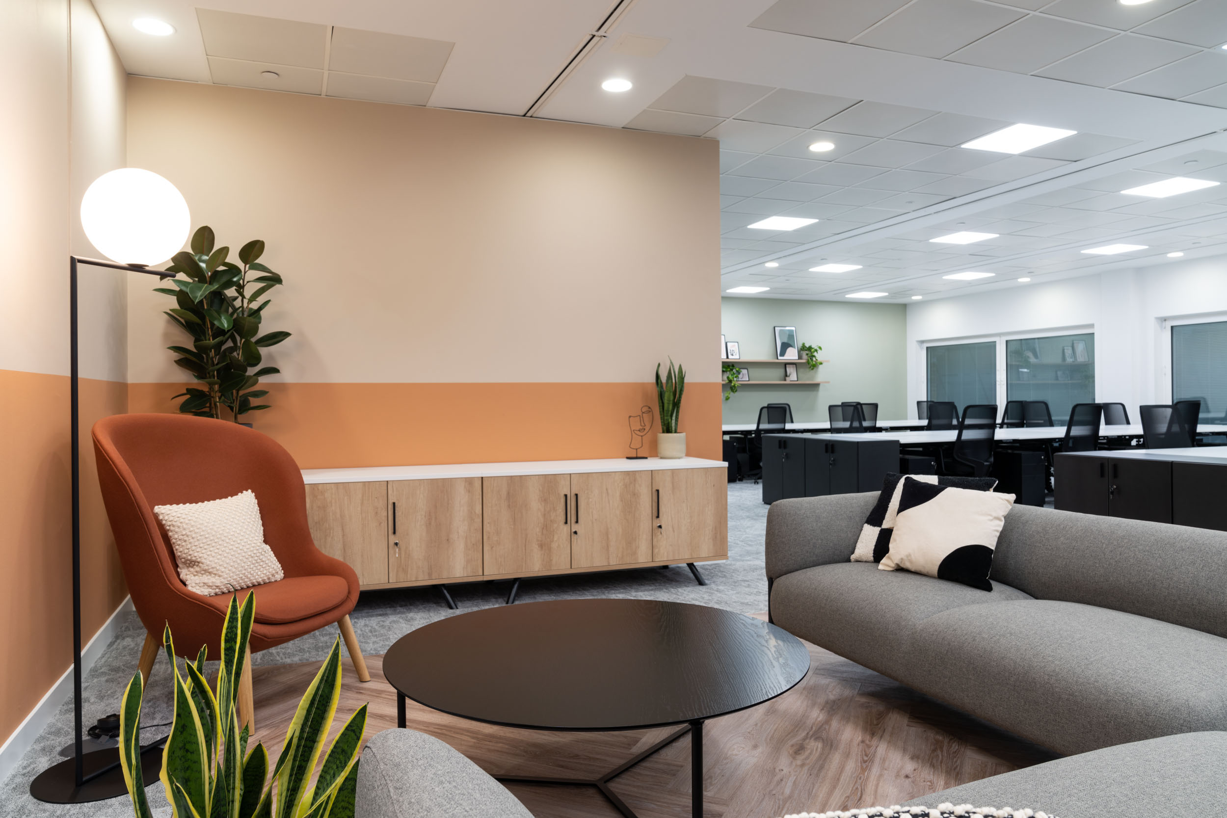 Flexible workspace and lounge with modern decor at One Strand, Trafalgar Square - Tenant-Ready™ fit-out by Ambit