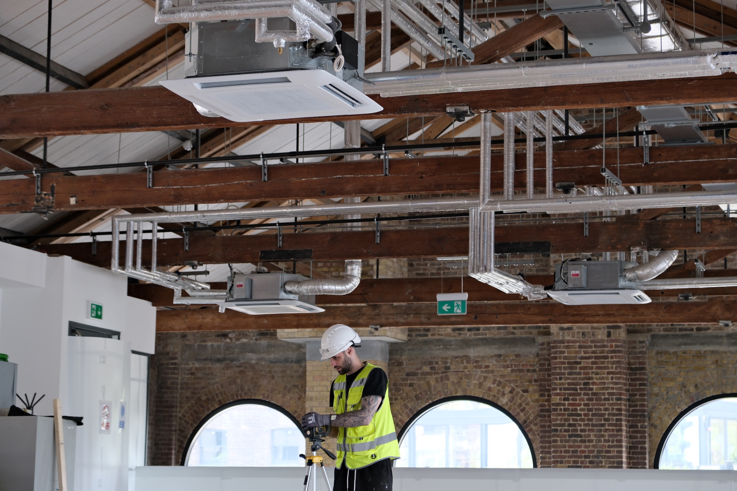 Technical Services exposed fan ducts on the ceiling