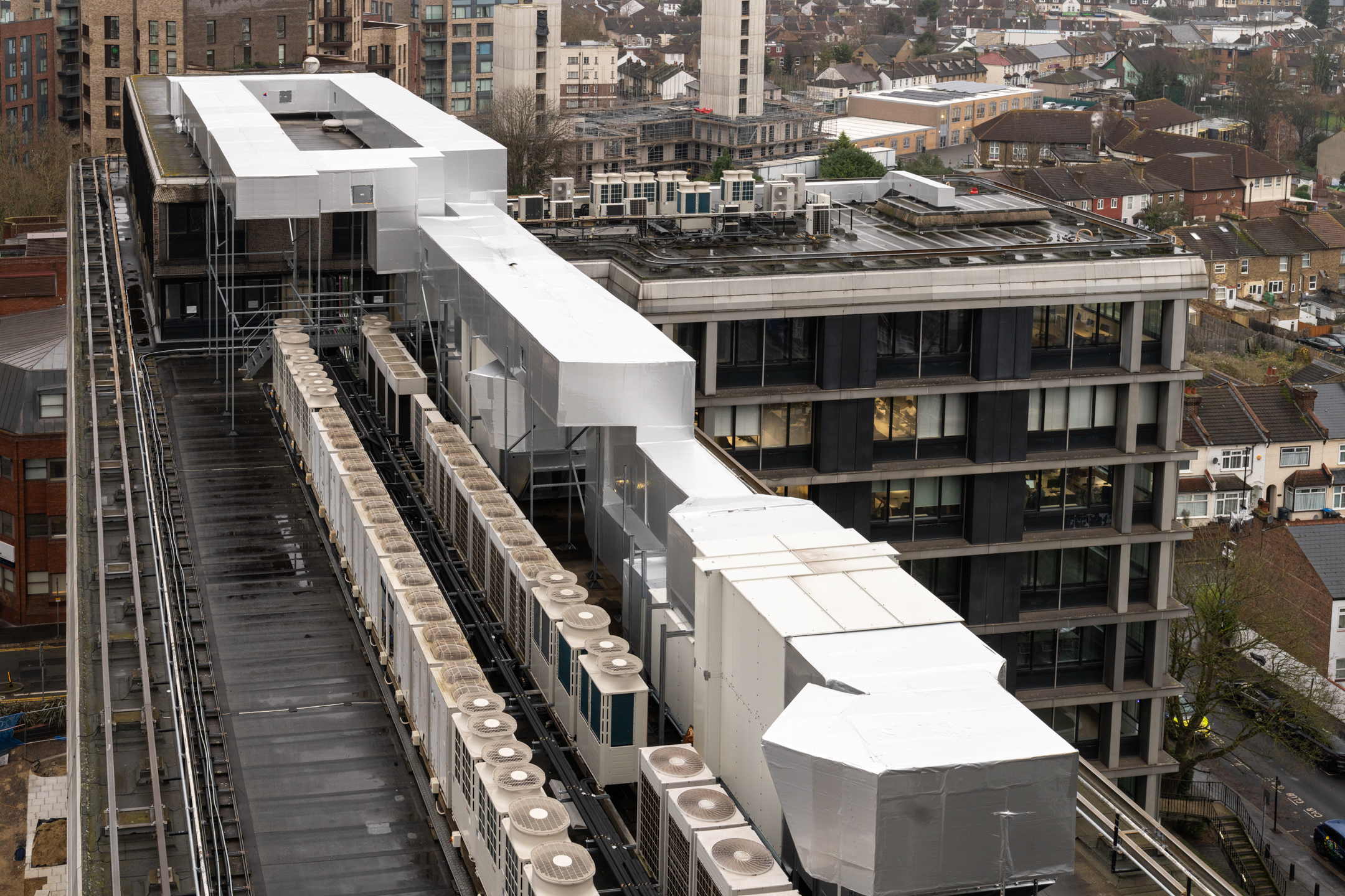 A detailed view of the extensive MEP upgrades at Mosaic East, showcasing new HVAC and electrical systems to future-proof the building.